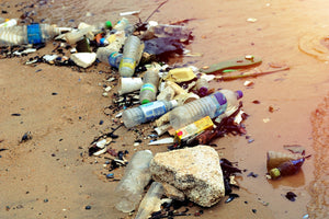 plastic trash littered on a beach